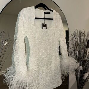 White sequins dress with feathered hands